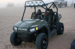 Polaris RZR with paddle tires - Dune Buggy Flats