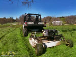 John Deere Gator XUV 825i with towable rough cut mower