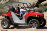 RZR with roll cage and side panel from DragonFire Racing