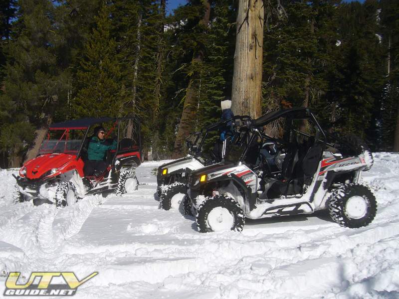 Kawasaki Teryx and two Polaris RZR S in the Sierra Snow