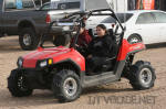 Polaris RZR with paddle tires in Glamis