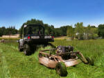 John Deere Gator XUV 825i with towable rough cut field mower