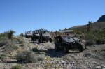 Three Rhinos and one RZR on the trail after leaving Primm, NV