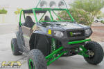 Long Travel RZR 170 with custom cage and light bar